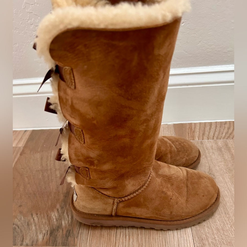 Cozy Brown Winter UGG Women's Bailey Bow Tall II boots in chestnut color. - Picture 5 of 5
